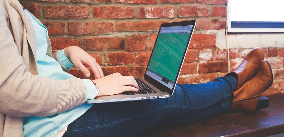 typing on laptop